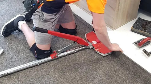 Carpet layer using a power stretcher to stretch and fit carpet during installation in a Whangarei home